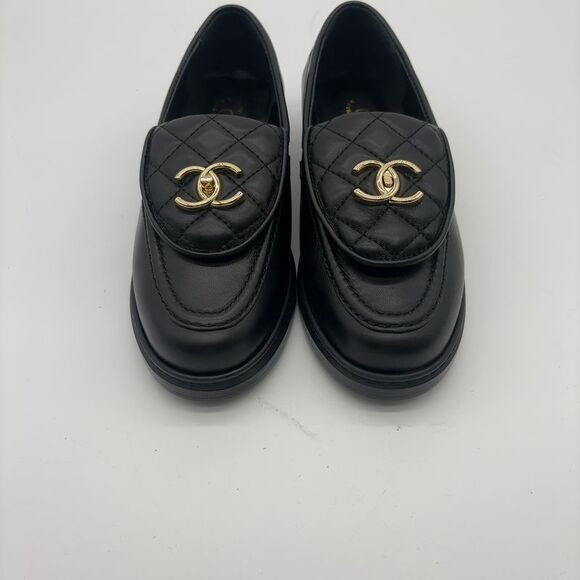 CHANEL Shoes - CHANEL Quilted Flats with Gold Logo